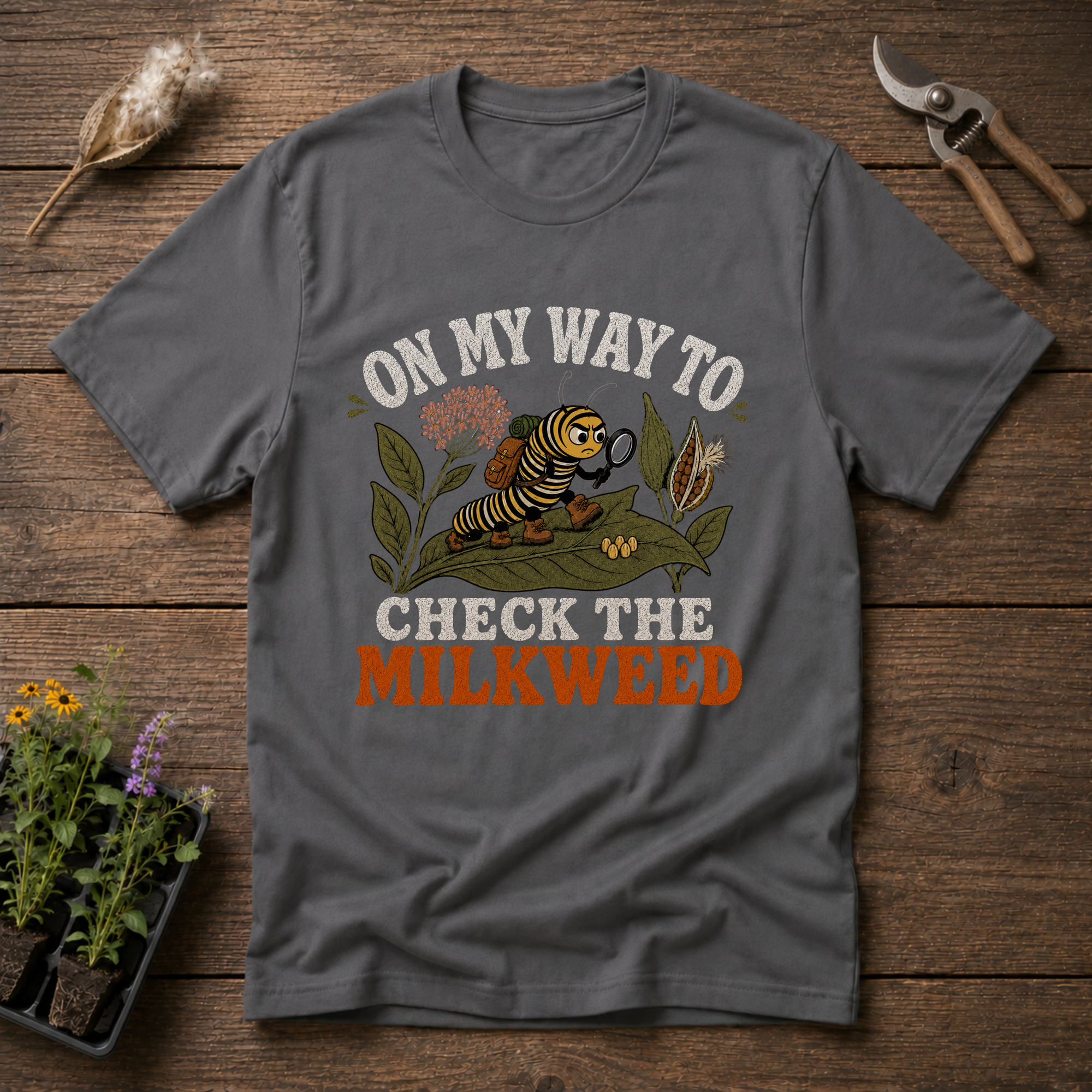 Checking The Milkweed T-Shirt