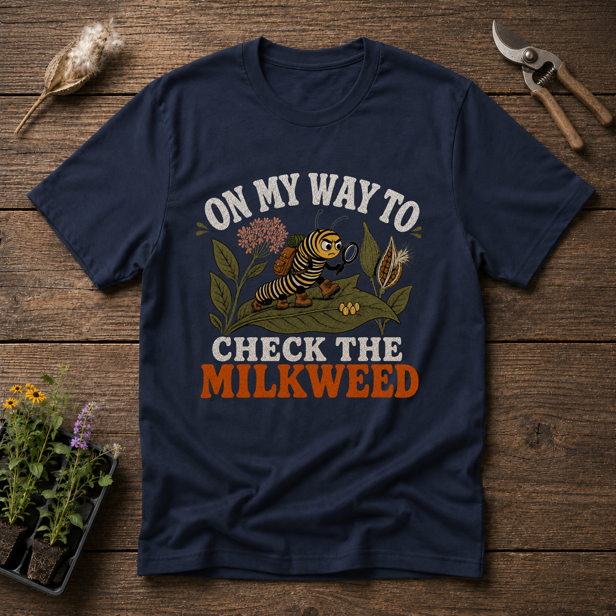 Checking The Milkweed T-Shirt
